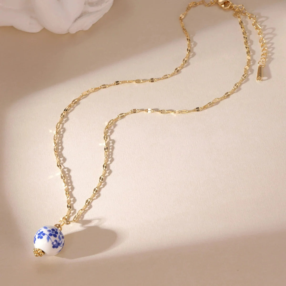 Blue ceramic pendant necklace