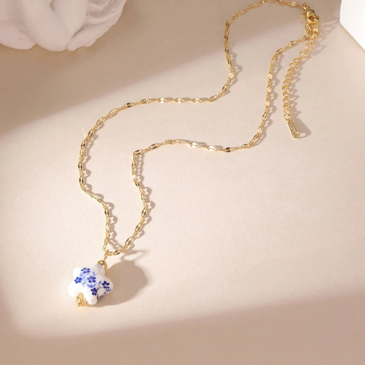 Blue ceramic pendant necklace