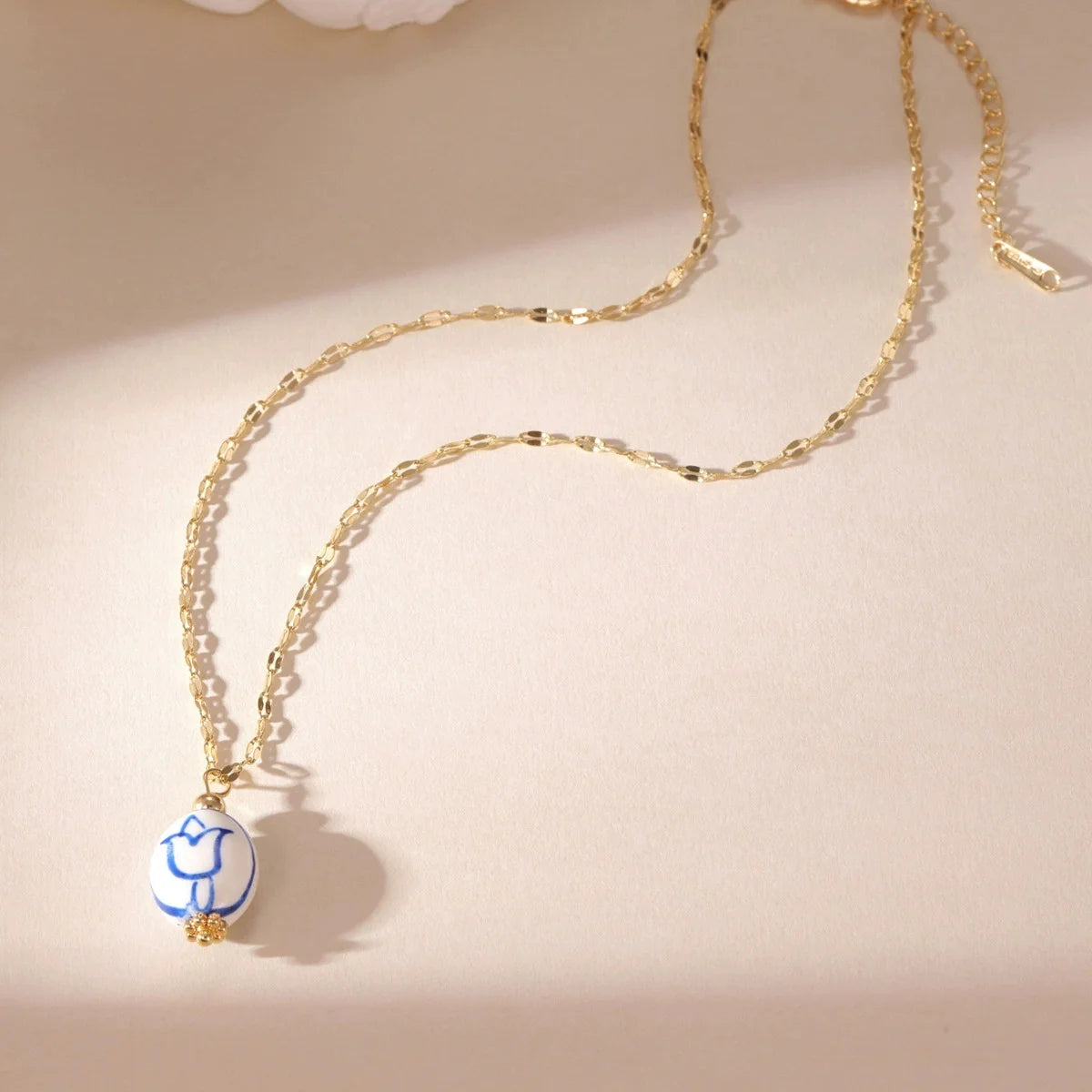 Blue ceramic pendant necklace
