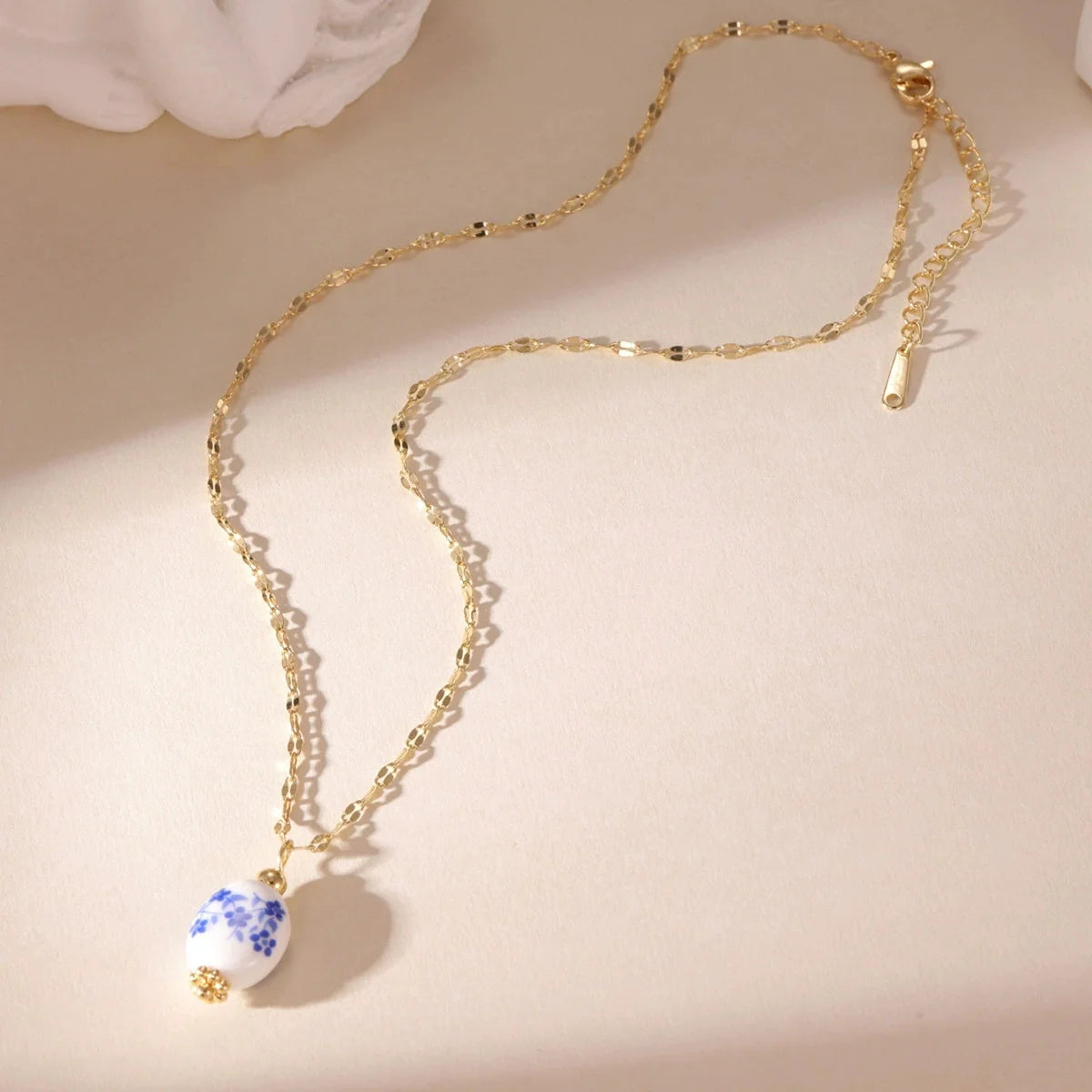 Blue ceramic pendant necklace