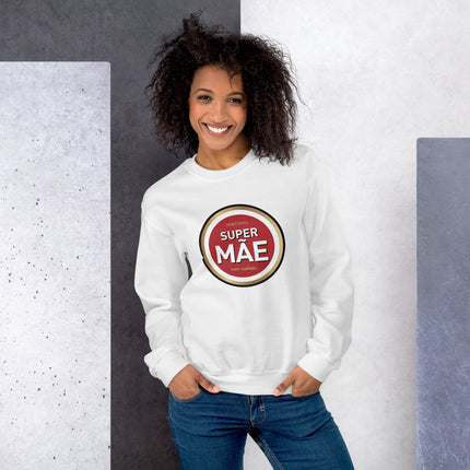 Woman wearing a white sweatshirt with 'Super Mae' logo against a gray and white background